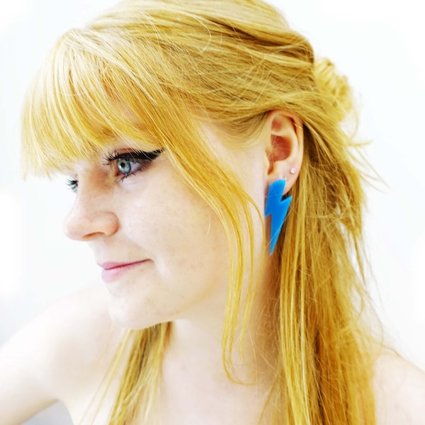 Large colour pop LIGHTNING BOLT earrings. A touch of featherweight fierceness to frame the face!