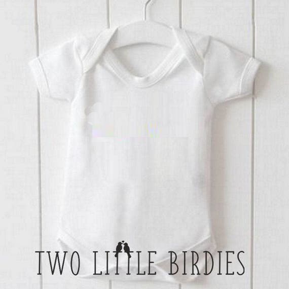 baby white romper suit