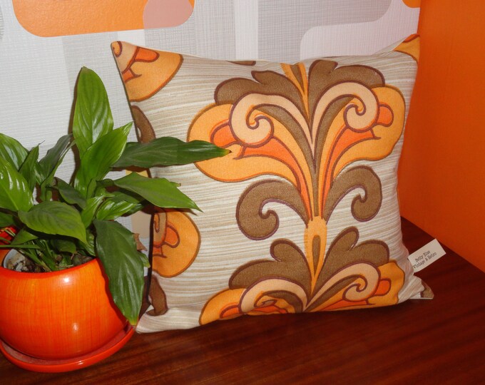 Orange 1960s swirl pattern cusion covers