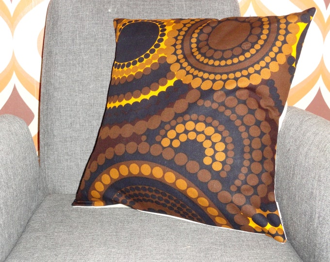 vintage retro 1960s/70s geometric orange yellow and brown spot and sphere swirl pattern cushion cover