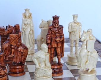 May include: A wooden chess set with brown and white pieces. The pieces are arranged on a chessboard with a brown and white checkered pattern. The pieces include a king, queen, knight, bishop, rook, and pawn.