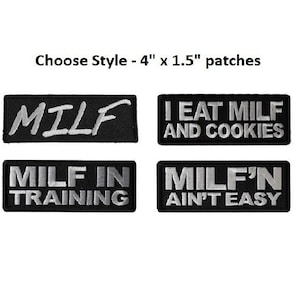 May include: Four black and white iron-on patches with different sayings. The patches are 4 inches by 1.5 inches. The sayings are "MILF", "I EAT MILF AND COOKIES", "MILF IN TRAINING", and "MILF'N AIN'T EASY".
