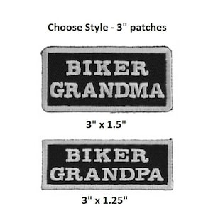 May include: Two black and white iron-on patches. The top patch reads "BIKER GRANDMA" and measures 3 inches by 1.5 inches. The bottom patch reads "BIKER GRANDPA" and measures 3 inches by 1.25 inches.