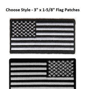 May include: Two styles of iron-on American flag patches. The top patch has the stars on the left side of the flag. The bottom patch has the stars on the right side of the flag. Both patches are 3 inches by 1-5/8 inches.