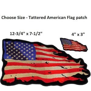May include: Two tattered American flag patches, one measuring 12-3/4 inches by 7-1/2 inches and the other measuring 4 inches by 3 inches. Both patches are embroidered with red, white, and blue thread and have a black border.
