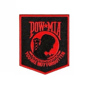 May include: Black and red embroidered patch with the words "POW*MIA You Are Not Forgotten" and a silhouette of a soldier's head in a circle.