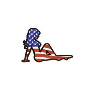 May include: A silhouette of a person in a reclining pose, with the American flag pattern superimposed on the figure.
