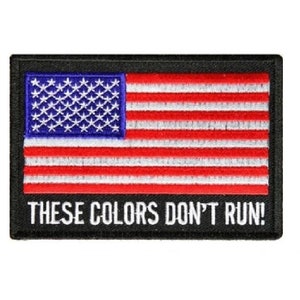 May include: An embroidered patch with an American flag and the text "These Colors Don't Run!"