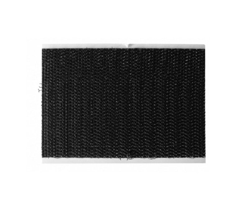 May include: Black hook and loop fastener tape. The tape is made of a woven fabric with a rough texture.