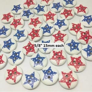 May include: A collection of 5/8 inch (15mm) wooden buttons with a white background and red and blue star designs.