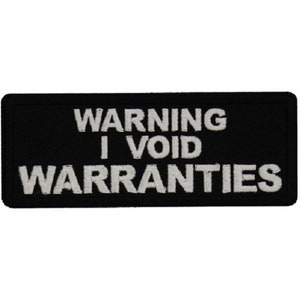 May include: Black and white embroidered patch with the text "WARNING I VOID WARRANTIES".