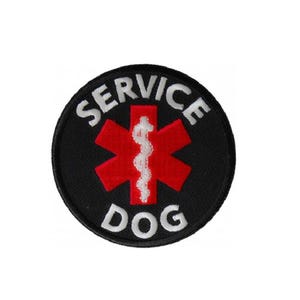May include: A circular embroidered patch with a black background. It features a red six-pointed star of life symbol in the center with a white serpent and staff emblem. The white text SERVICE is arched above and DOG is arched below the star.