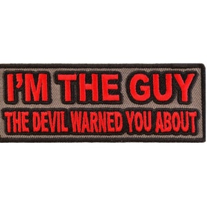 May include: Red embroidered patch with black outline on a gray background. The patch reads "I'm the guy the devil warned you about."