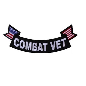 May include: Black and white embroidered patch with the text "COMBAT VET" in a curved banner shape. The patch is decorated with two American flags on either end.