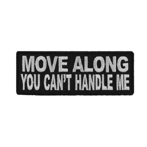 May include: Black embroidered patch with white text that reads "Move Along You Can't Handle Me".