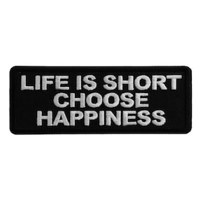 May include: Black embroidered patch with white text that reads "Life is short choose happiness."