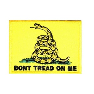 May include: A yellow embroidered patch with a coiled snake and the words "DONT TREAD ON ME".