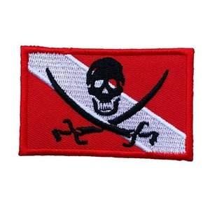 May include: Red and white scuba diving flag with a black skull and crossbones.