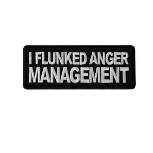 May include: Black and white embroidered patch with the text "I Flunked Anger Management".