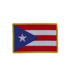 May include: An embroidered patch of the Puerto Rican flag. The flag is red, white, and blue with a white star in the blue triangle.