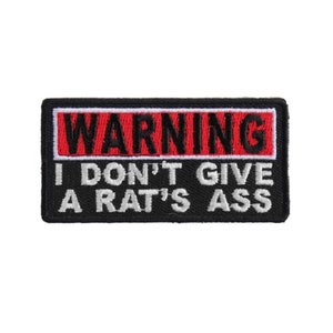 May include: Black and red embroidered patch with white text that reads "WARNING I DON'T GIVE A RAT'S ASS".