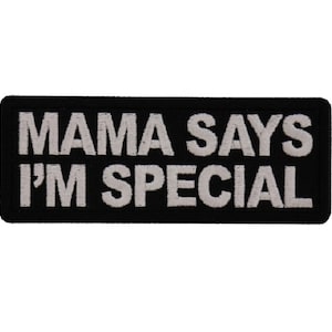 May include: Black and white embroidered patch with the text "Mama Says I'm Special".