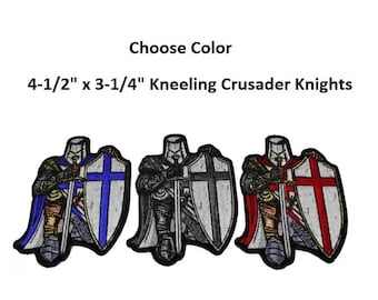 May include: Three embroidered patches of a kneeling crusader knight holding a sword and shield. The patches are 4-1/2 inches by 3-1/4 inches. The shields are white with a red cross, a black cross, and a blue cross.