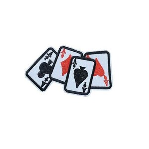 May include: Four playing cards, each an Ace, are arranged in a pile. The cards are a spade, a heart, a diamond, and another spade. The cards are white with black and red suits.