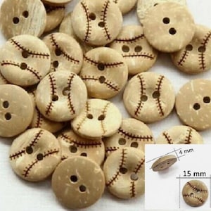 May include: A collection of baseball-themed buttons. The buttons are light brown with dark brown stitching, resembling baseballs. Each button has two holes for sewing. The buttons are approximately 0.6 inches in diameter and 0.16 inches thick.