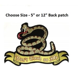May include: A black and gold embroidered patch featuring a coiled rattlesnake with the text "Don't Tread on Me" on a yellow banner. The patch is available in two sizes: 5 inches or 12 inches.