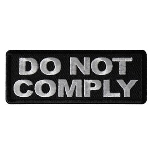 May include: Black embroidered patch with white text that reads "DO NOT COMPLY".