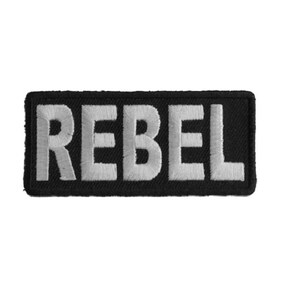 May include: Black embroidered patch with the word "REBEL" in white lettering.