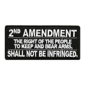 May include: Black and white embroidered patch with the text "2ND AMENDMENT THE RIGHT OF THE PEOPLE TO KEEP AND BEAR ARMS, SHALL NOT BE INFRINGED."