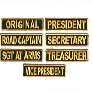 May include: A set of seven rectangular embroidered patches with black backgrounds and gold-colored lettering. The patches feature the text: ORIGINAL, PRESIDENT, ROAD CAPTAIN, SECRETARY, SGT AT ARMS, TREASURER, and VICE PRESIDENT in a bold font.