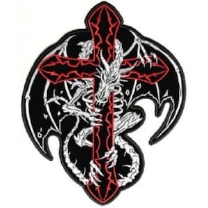 May include: A black and white embroidered patch of a dragon wrapped around a red cross. The dragon's wings are spread out and the cross is in the center of the patch.