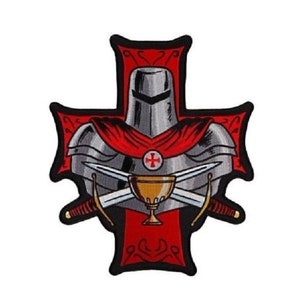May include: Embroidered patch featuring a knight in silver armor with a red cape, set against a red cross. Two crossed swords and a golden chalice are below the knight. The patch has a black border.