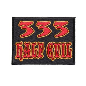 May include: Black embroidered patch with red and yellow stitching. The patch features the number "333" and the text "HALF EVIL".