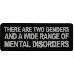 May include: A rectangular black embroidered patch with a white border. The text in white capital letters reads: THERE ARE TWO GENDERS AND A WIDE RANGE OF MENTAL DISORDERS. The patch has a clean, stitched finish and a bold, high-contrast design.