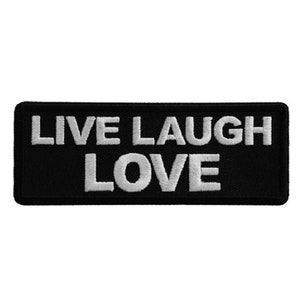 May include: Black embroidered patch with white text that reads "LIVE LAUGH LOVE".