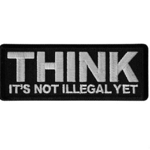 May include: Black rectangular patch with the word "THINK" in large, white, block letters above the text "IT'S NOT ILLEGAL YET". The patch has a white border and is set against a white background.