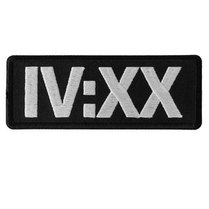 May include: Black embroidered patch with white lettering that reads "IV:XX".