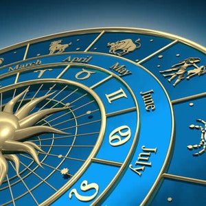 May include: A detailed illustration of a golden sunburst and zodiac wheel against a blue background. The wheel features astrological symbols and the names of the months, with a focus on the signs of Gemini and Cancer.