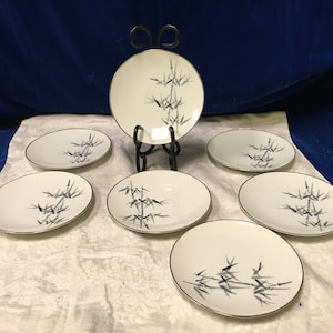 7 Vintage Noritake Nippon Toki Kaisha Untertassen - 6 ”Durchmesser - 1950er Jahre.