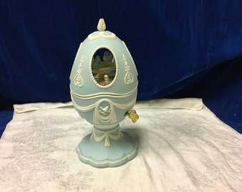 Huevo musical vintage Avon “Simply Elegant” con pájaros azules - 2003.