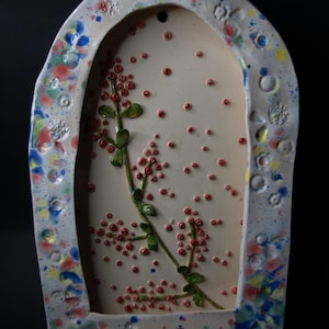Ceramic altar shrine cranberries.