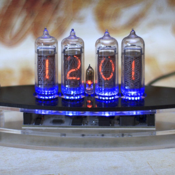 Nixie clock IN14 in acrylic case with adjustable blue backlight. Acrylic case.