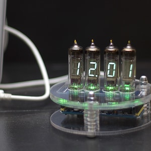 VFD Ice tube clock. IV-6 nixie tubes and adjustable green backlight. Acrylic case and USB supply.