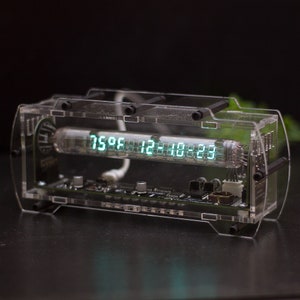VFD clock on IV-27 vacuum fluorescent tube. Original acrylic case design. USB supply.