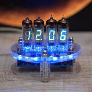 VFD Ice tube clock. IV-6 nixie tubes and adjustable blue backlight. Acrylic case and USB supply.
