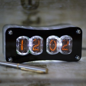IN12 Nixie clock. Mid century style. Adjustable white backlight and acrylic case.